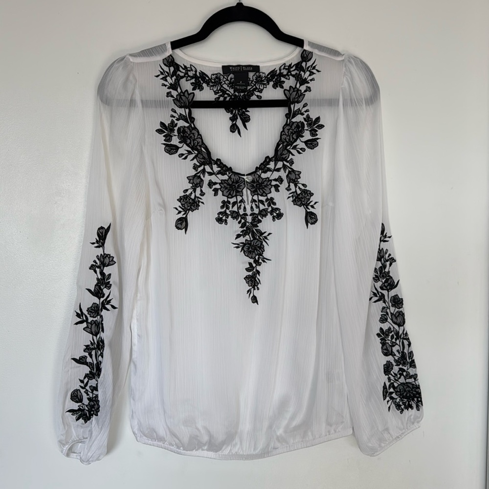 White House Black Market white blouse with black lace appliqué - size 4